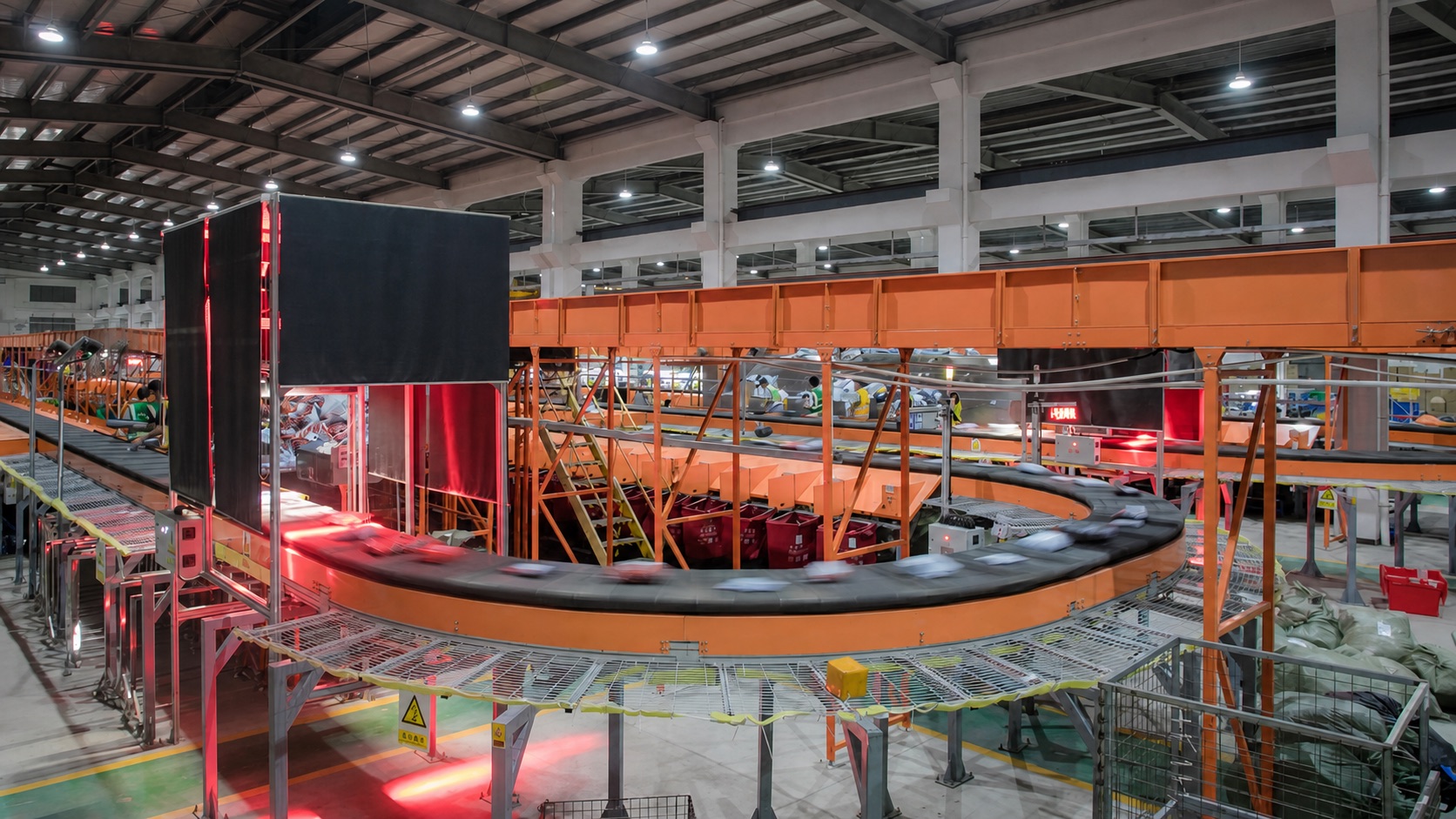 Unbranded parcel sorting operation with automated conveyor lanes.